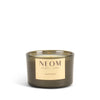 NEOM happiness scented candle with a gold label on a white background