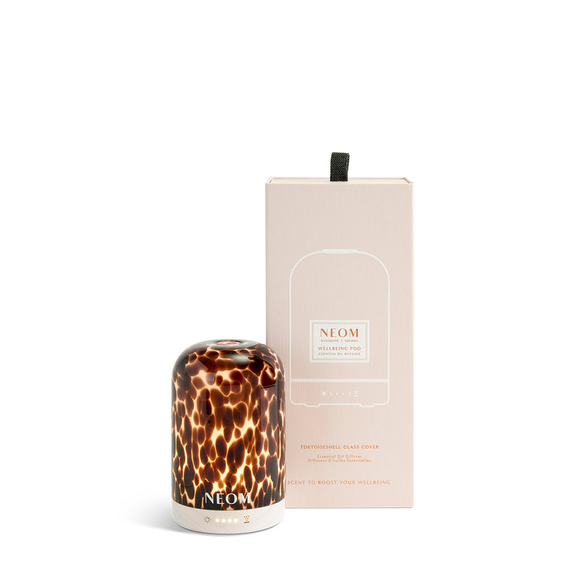 NEOM diffuser with packaging on a white background