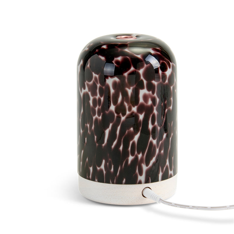 NEOM diffuser on a white background