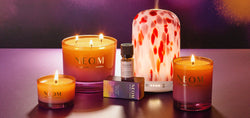 NEOM Cosy Nights collection of candles and an essential oil blend with the limited edition clementine pod diffuser 