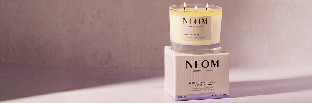 NEOM Perfect Night’s Sleep scented candle on box, lavender, chamomile and patchouli.