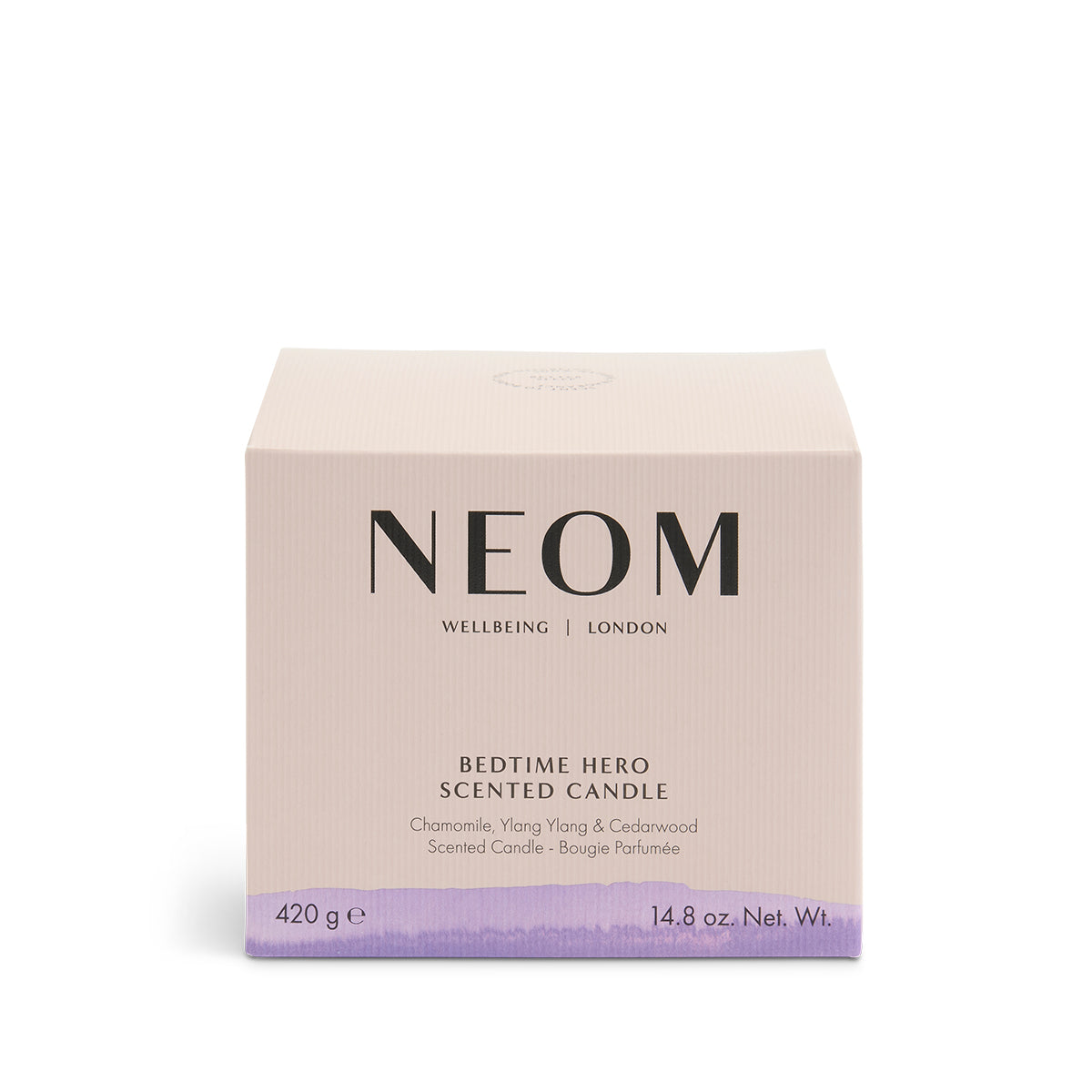 Product box with Neom logo and purple pattern at the bottom of box.