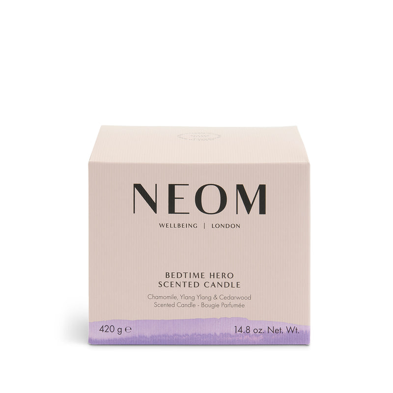 Product box with Neom logo and purple pattern at the bottom of box.
