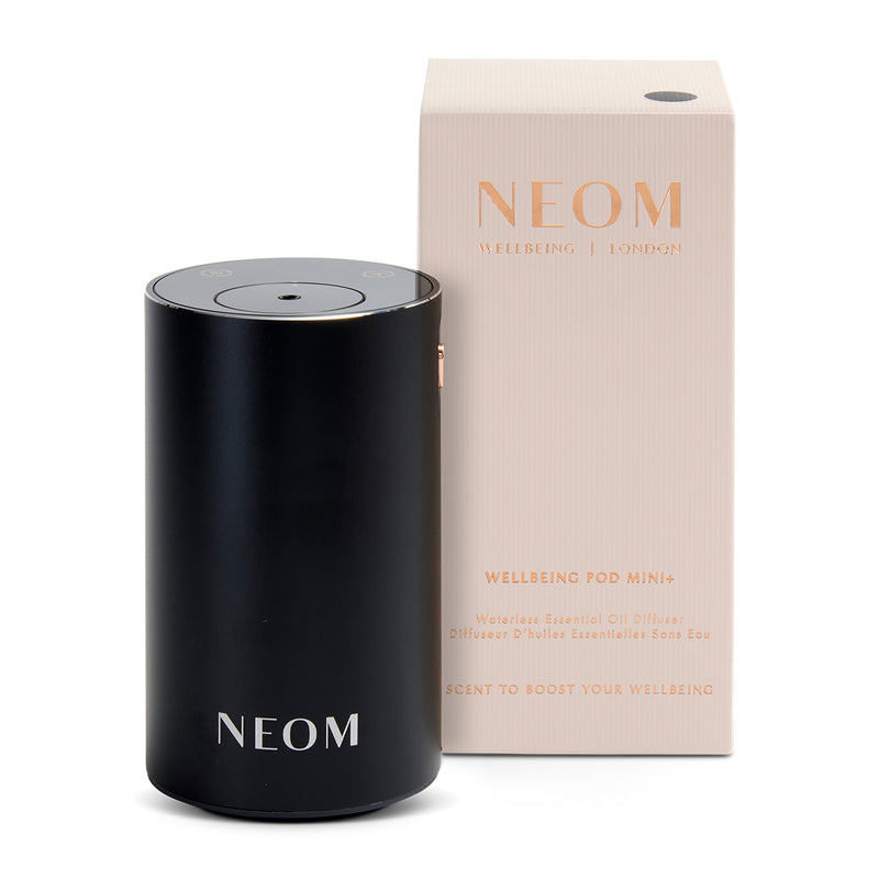 Black NEOM product and packaging on a white background