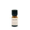 NEOM Christmas Wish essential oil blend bottle on a white background