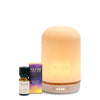 NEOM diffuser and essential oil blend on a white background