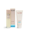 NEOM skincare products including a bottle, box, and tube on a white background