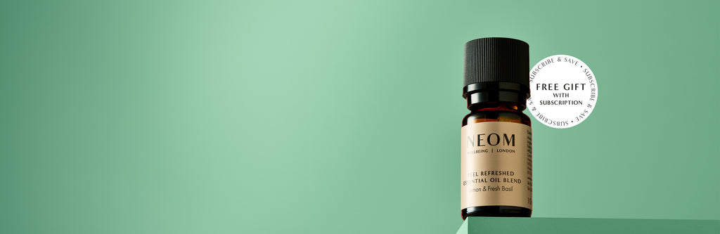 NEOM feel refreshed essential oil blend with a 'free gift with subscription' and 'subscribe and save' roundel 