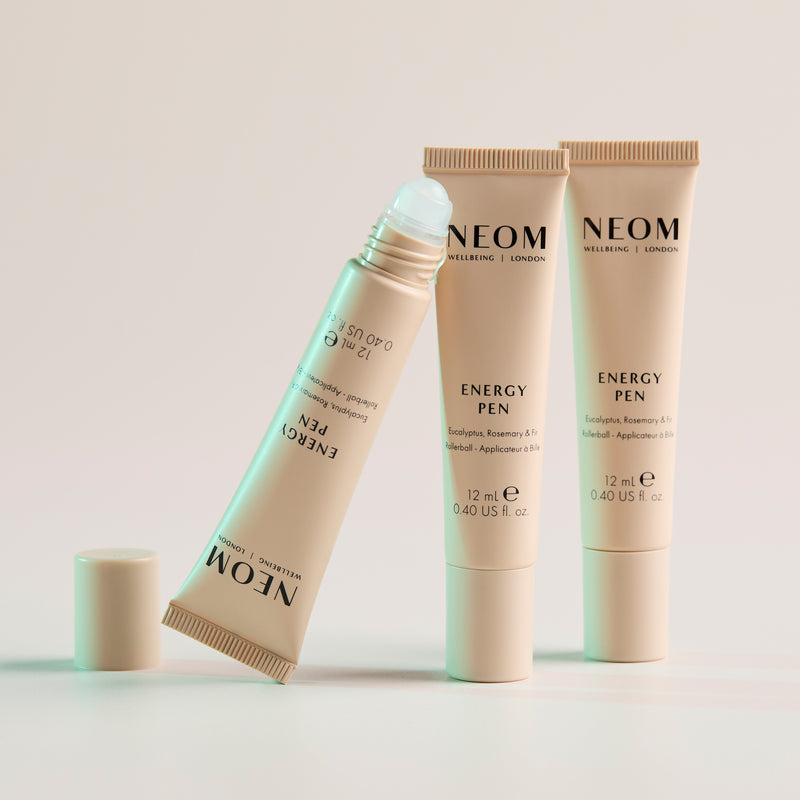 Three NEOM Energy Pen on a light background