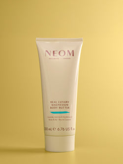 NEOM Real Luxury Magnesium Body Butter on yellow background for Father’s Day gift.