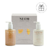 NEOM hand wash and lotion set with packaging on a white background with a Perfect Gift roundel with a present