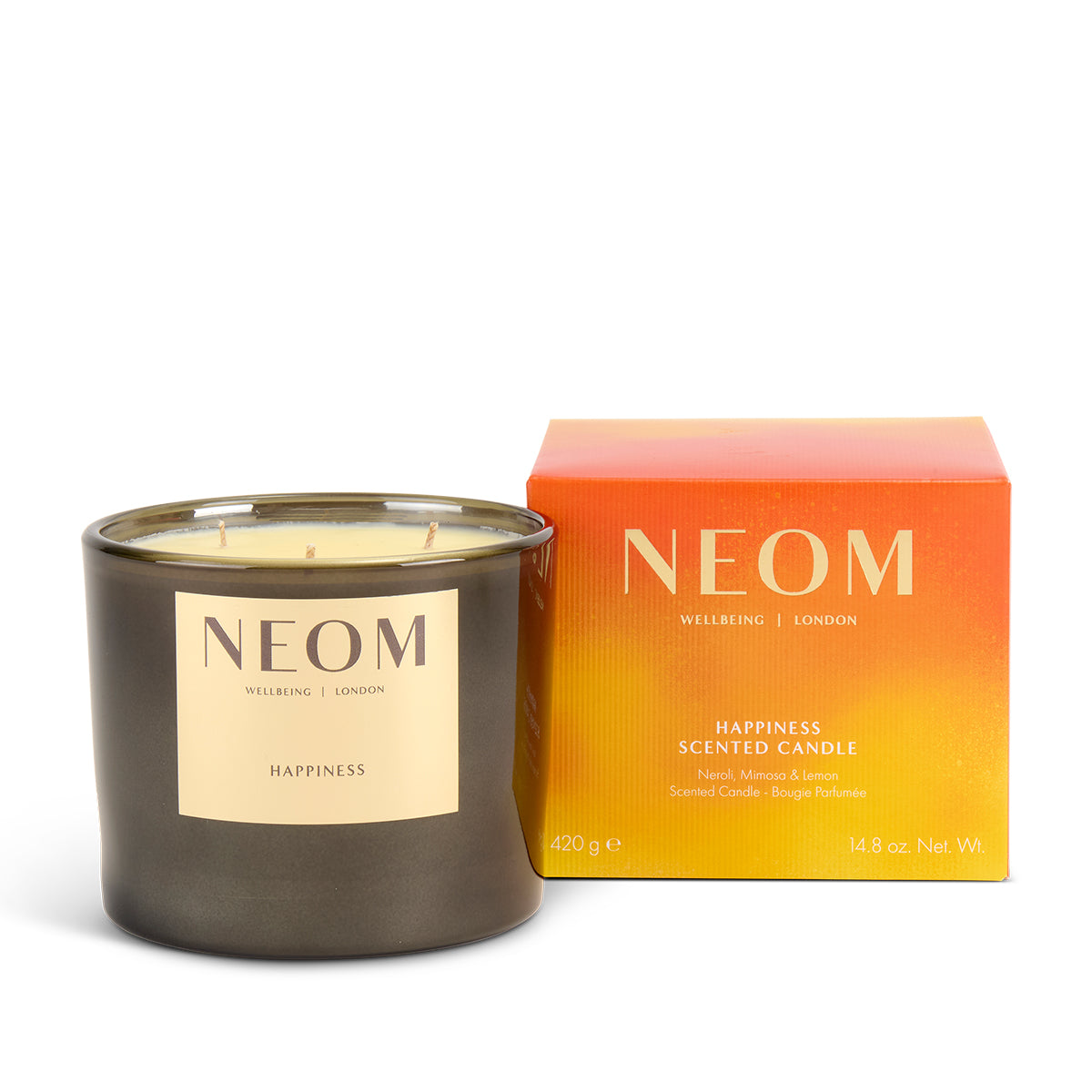 NEOM limited edition Happiness scented 3 wick candle with packaging on a white background