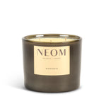 NEOM limited edition Happiness scented 3 wick candle on a white background