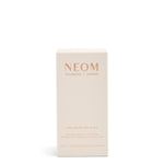 NEOM product packaging on a white background