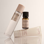 NEOM Perfect Night's Sleep Mist, Essential Oil and Magnesium Body Butter on a cream background