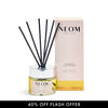 NEOM Happiness Reed Diffuser with packaging on a white background