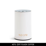 White Pod Mini Diffuser with 'NEOM' branding on a light gray background