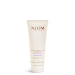 NEOM body butter tube on a white background