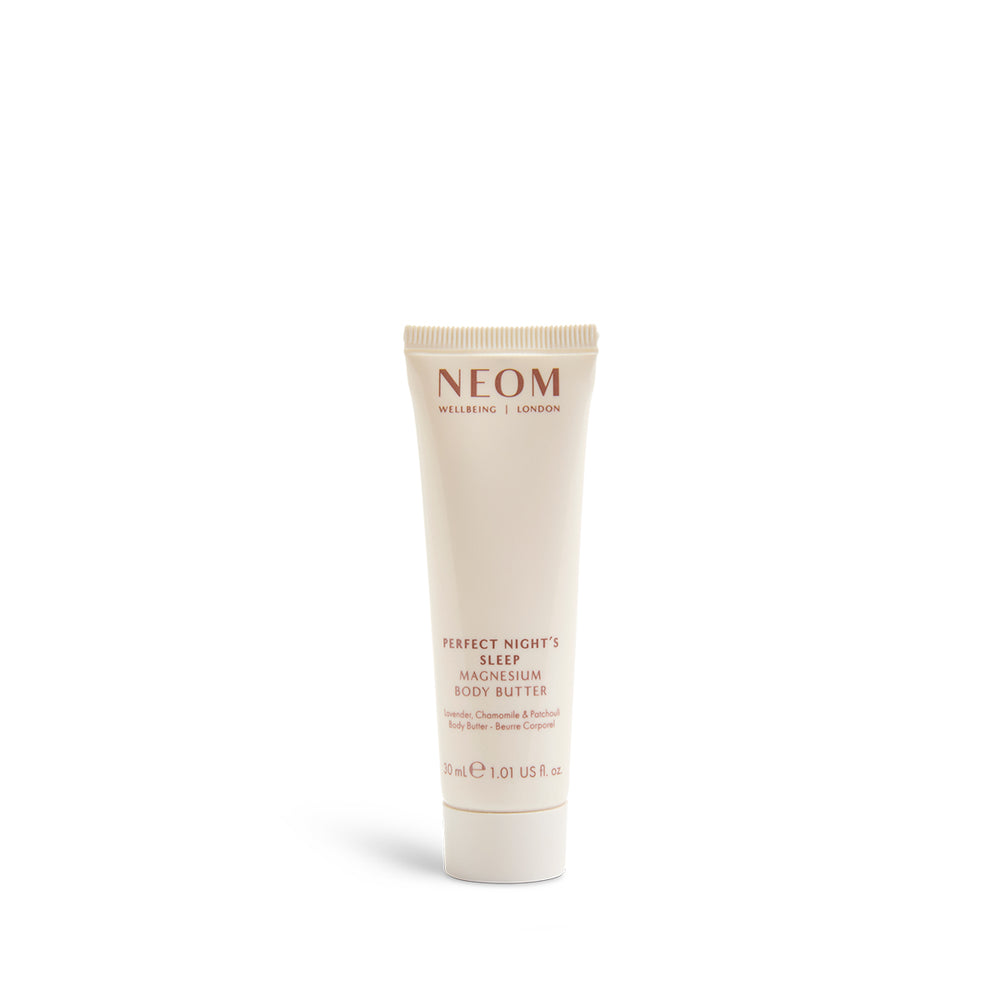NEOM body butter tube on a white background
