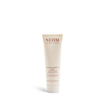 NEOM body butter tube on a white background