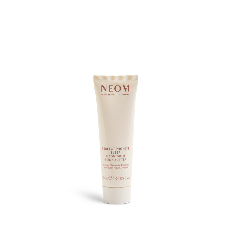 NEOM body butter tube on a white background