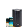 NEOM essential oil blend, diffuser, and packaging on a white background
