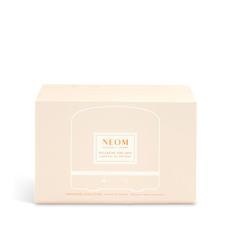 NEOM product packaging on a white background