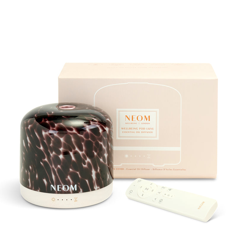 NEOM diffuser with packaging on a white background