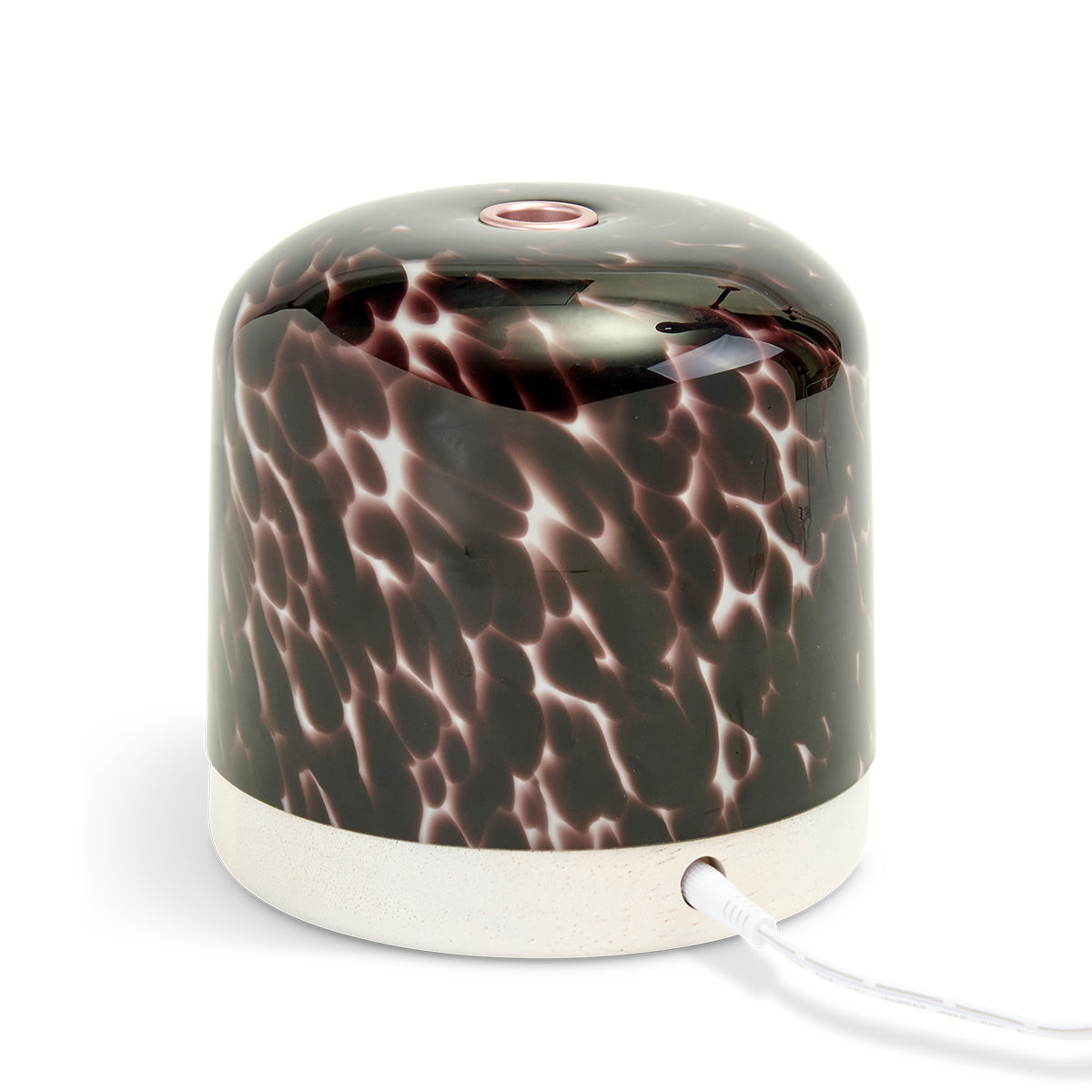 Marble-patterned NEOM diffuser on a white background