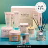 Collection of NEOM real luxury products on a blue background with 'LIMITED TIME' text. Save 45%.