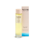 NEOM Real Luxury Body Oil with packaging on a white background