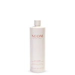 NEOM bottle on a white background