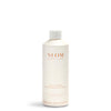 NEOM bottle of Real Luxury Magnesium Bath Milk on a white background