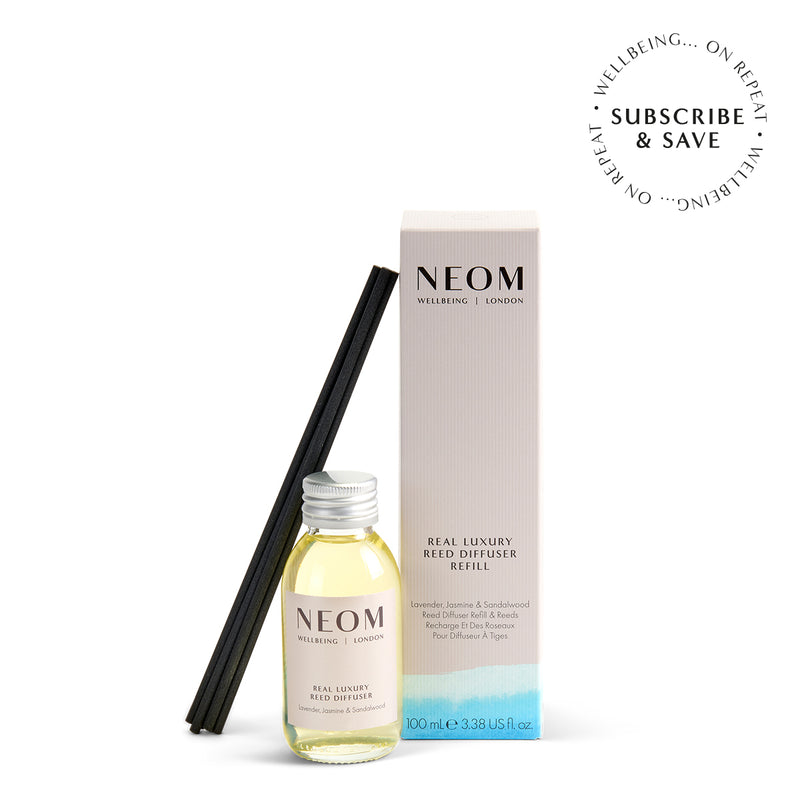 NEOM Real Luxury reed diffuser refill on a white background with subscription roundel