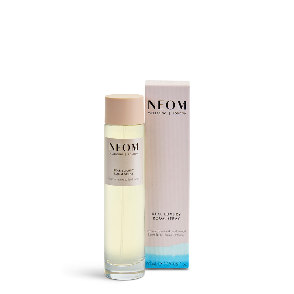 NEOM Real Luxury Room Spray bottle and packaging on a white background