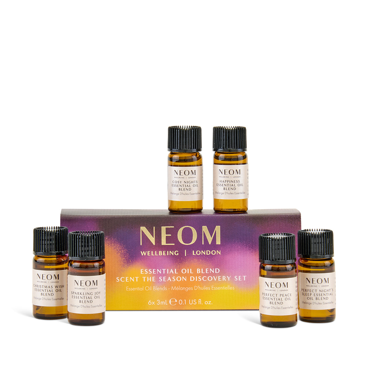 NEOM essential oil blend set with six small bottles in front of a branded box on a white background