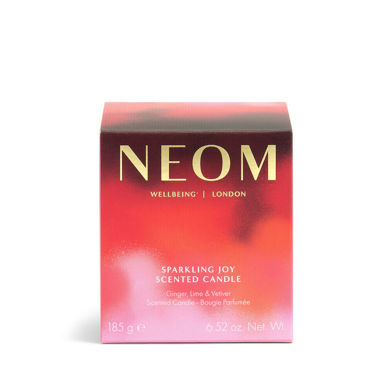 NEOM Sparkling Joy scented candle packaging on a white background