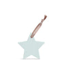 Star-shaped ornament with a pink ribbon on a white background