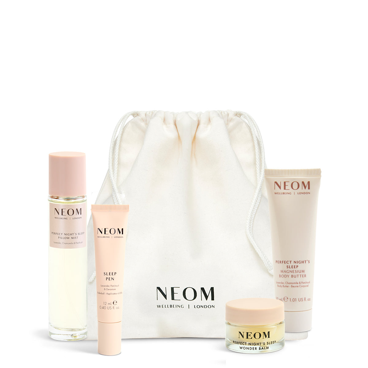 NEOM Sweet Dreams Travel Kit including a pillow mist, sleep pen, wonder balm and body butter with a white drawstring bag on a white background.