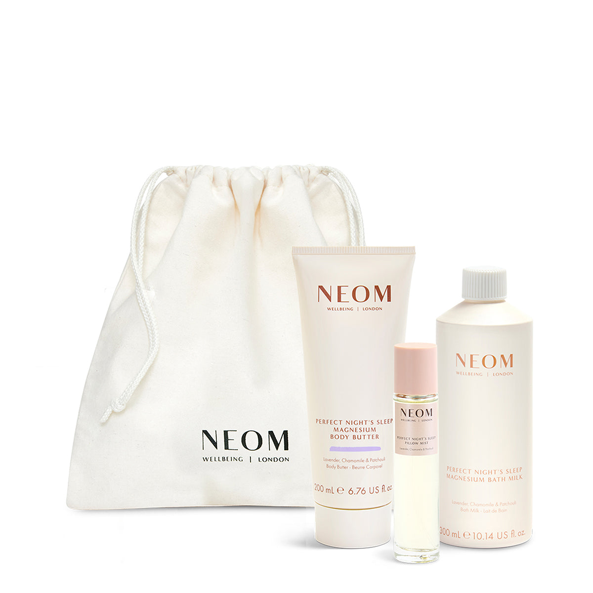 NEOM skincare products including a drawstring bag, body butter, and other items on a white background