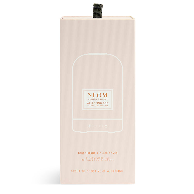 NEOM product packaging on a white background