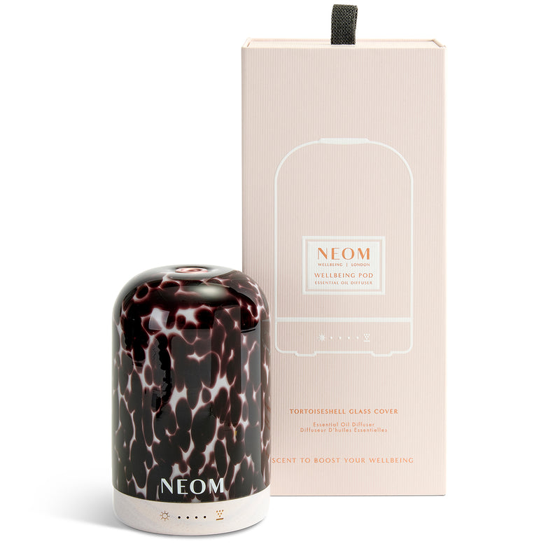 NEOM diffuser with tortoiseshell design and packaging on a white background
