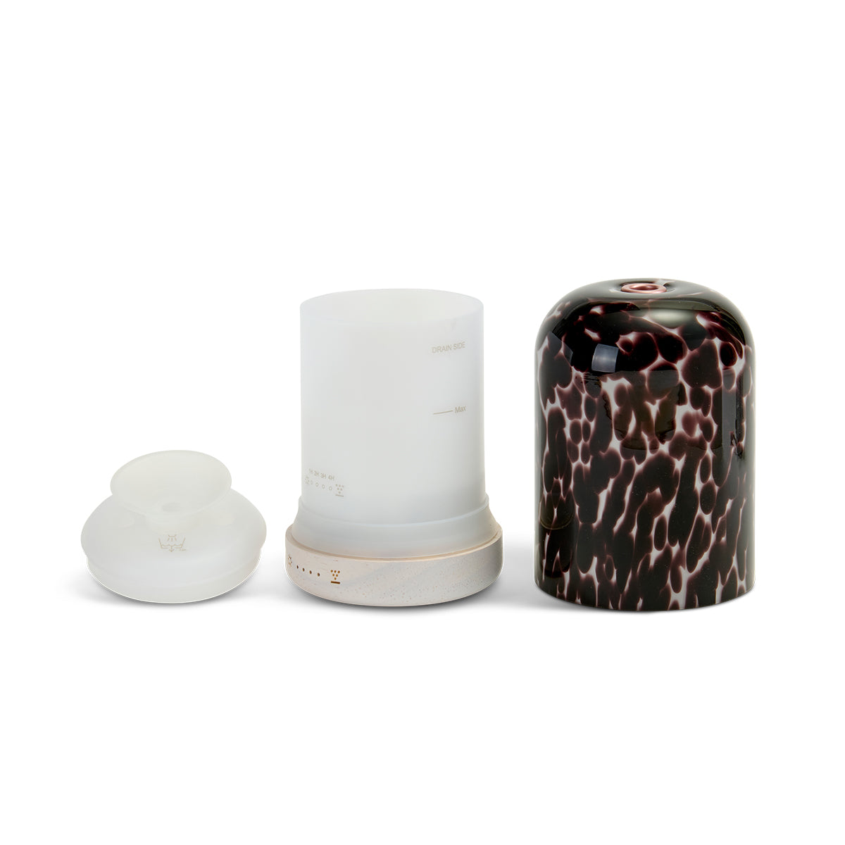 NEOM diffuser parts on a white background.