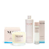 NEOM scents for newly weds bundle including candles and skincare on a white background