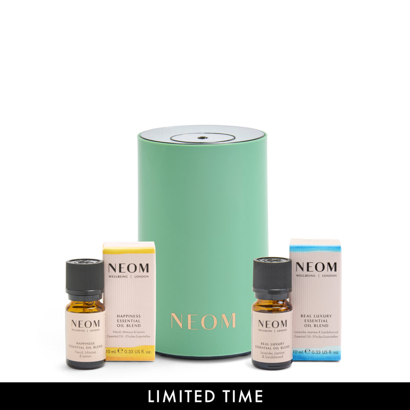 NEOM pod mini in mint and essential oil blends on a white background.