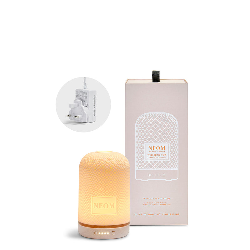 NEOM Wellbeing Pod with UK 3 Pin Plug in a roundel on a white background