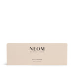 NEOM wick trimmer box with 'Wellbeing London' text on a white background